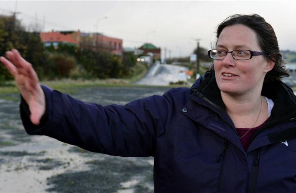 Bernadette White, of Dunedin explains how a container she was helping unpack toppled over in the...