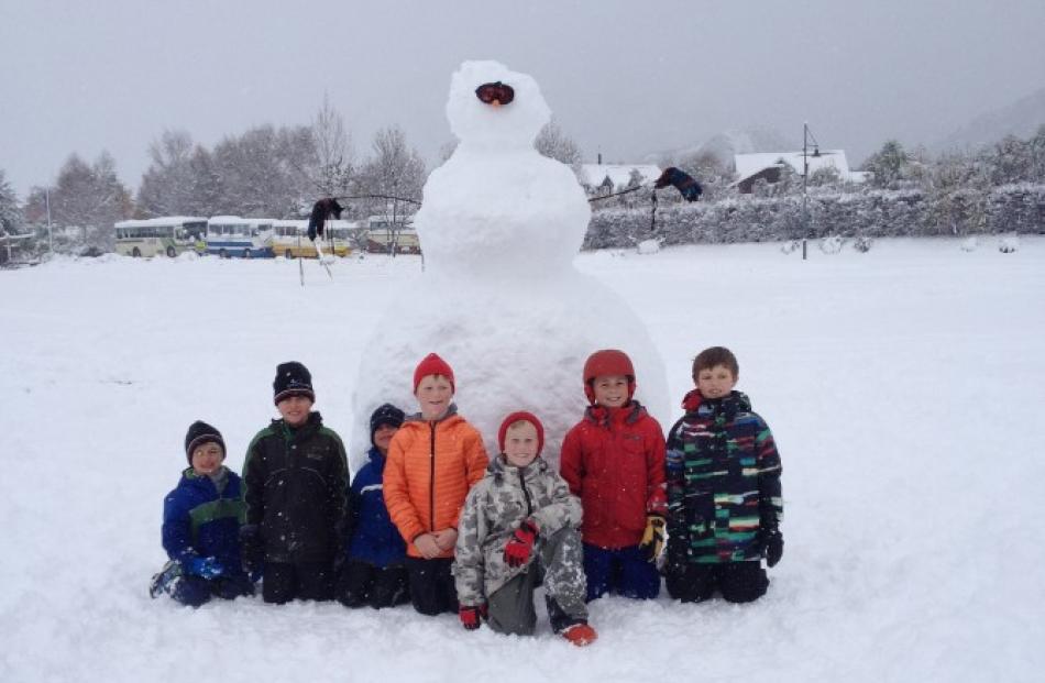 At Arrowtown Primary School, closed today, are (l-r): Willi Stanley (5), Charlie Stanley (9),...