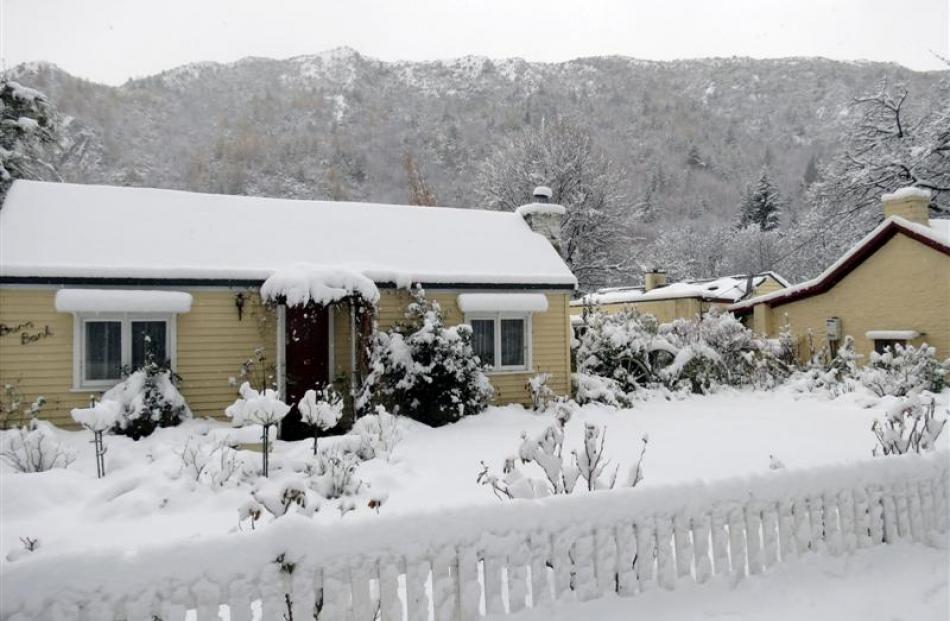 Arrowtown residents woke to 20cm of snow yesterday. This cottage is on Centennial Ave, near...