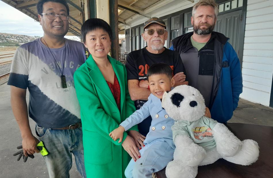 Oamaru Railway Station owners Jared Yuan (left) and Tina Wang, with their son Jayden, 4, were...