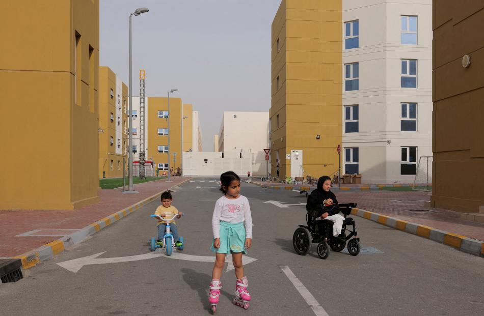 Palestinian child Tuqa Ossama Ibrahim (right), 12, from northern Gaza, who lost her legs to an...