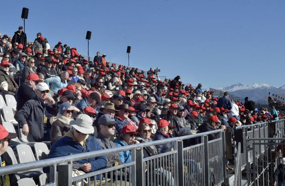 The crowd watches the action.