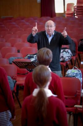 Conductor John Buchanan, of Alexandra, leads a pre-trip  rehearsal.  Photos by Jacqui van Dam.