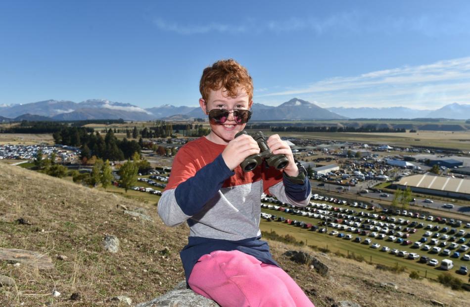 William Long, 10, of Kirwee, reckons he has a pretty good spot to watch the aviation action...