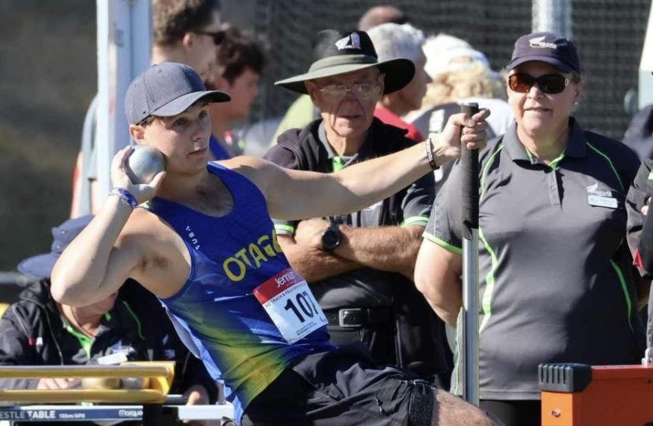 Dunstan High School pupil Mac Denniston on his way to a New Zealand athletics record in the under...