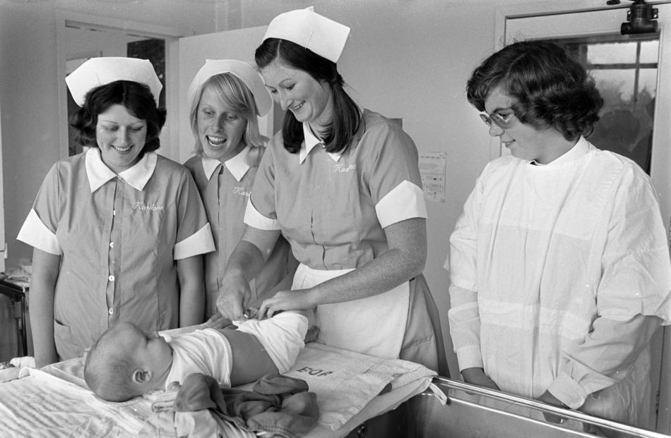 Trainee nurses Pam Kelly, Fiona McNair and Linda Pringle on the job in April 1978, with Otago...