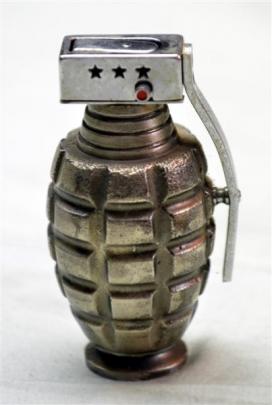 A cigarette lighter fashioned from a hand grenade.