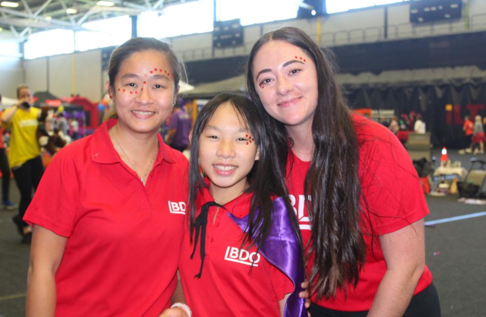 Anastasia Wijaya and Ciara Godiva, 11, of Indonesia, and Tania Wiid, of South Africa.