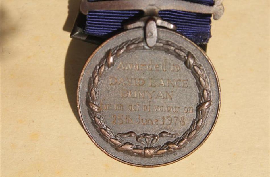 ... and his bronze medal.