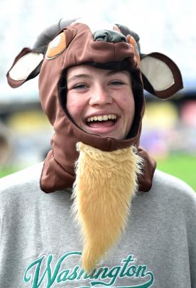 Claudia Townsend, 19, represents Aquinas College dressed as a goat.