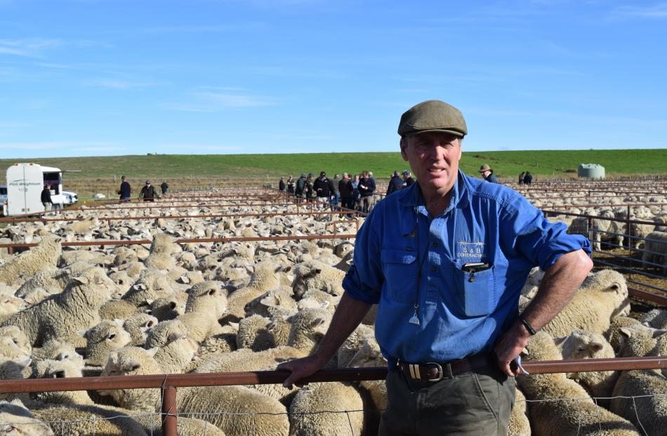 Lammermoor Station owner John Elliot, of Styx Valley, leans on a pen of nearly 200 of his...