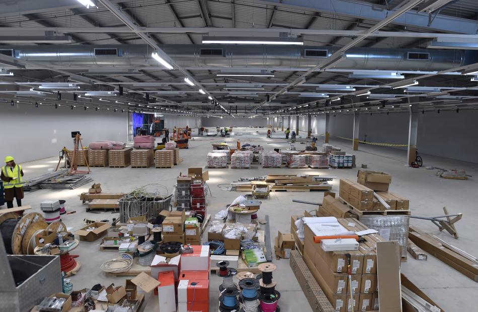 Supplies and machinery are laid out across the 4000sqm ground floor retail space of the Kmart...