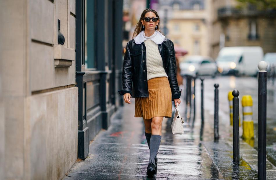 Knee-high socks with a shorter skirt.
