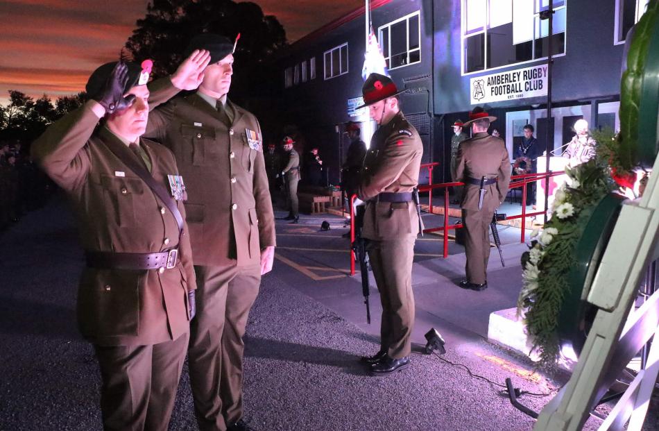 Army Captain Arno Bekker and Lance Corporal Dylan Fisher laid a wreath at the dawn service on...