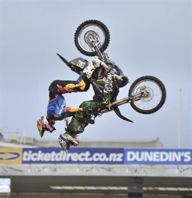 Travis Pastrana performs a backflip with passenger Bonnie McLeod at Carisbrook in February 2011.