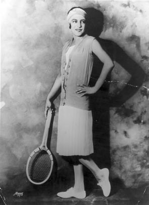 French tennis player Suzanne Lenglen "modelling a new tennis outfit" in 1926. 