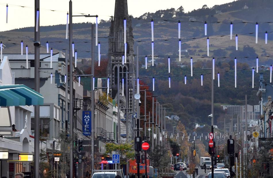 Overhead lighting, installed as part of upgrades to the George St retail quarter, hang above the...