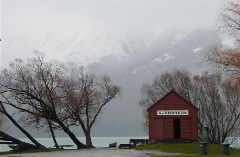 Glenorchy's famous wharfside shed stands by chilly Lake Wakatipu.