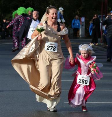 Andi and Violet Smillie, of Queenstown, compete in the Golden Mile on Saturday.