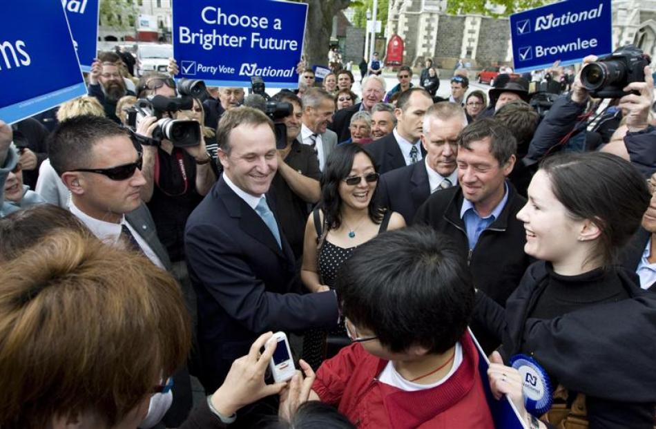 National Party leader John Key mixes with supporters in Christchurch. Photos by Gerard O'Brien...