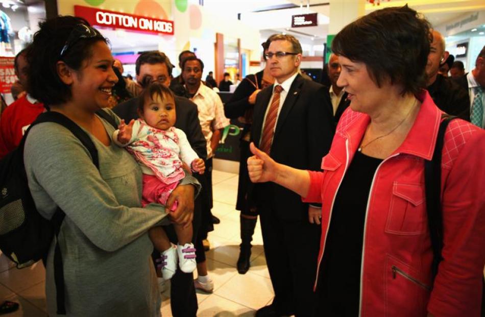 Prime Minister Helen Clark (right) meets and greets shoppers in Manukau City.