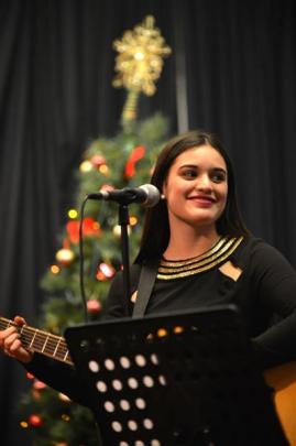 Renee O'Brien (15), of Dunedin, performs during the dinner.