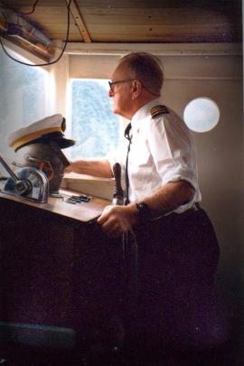 George in his happy place on the Western Explorer, Milford Sound