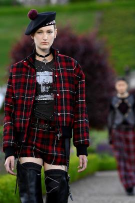 Models walk through the grounds of Drummond Castle in Perthshire. Photo: Reuters