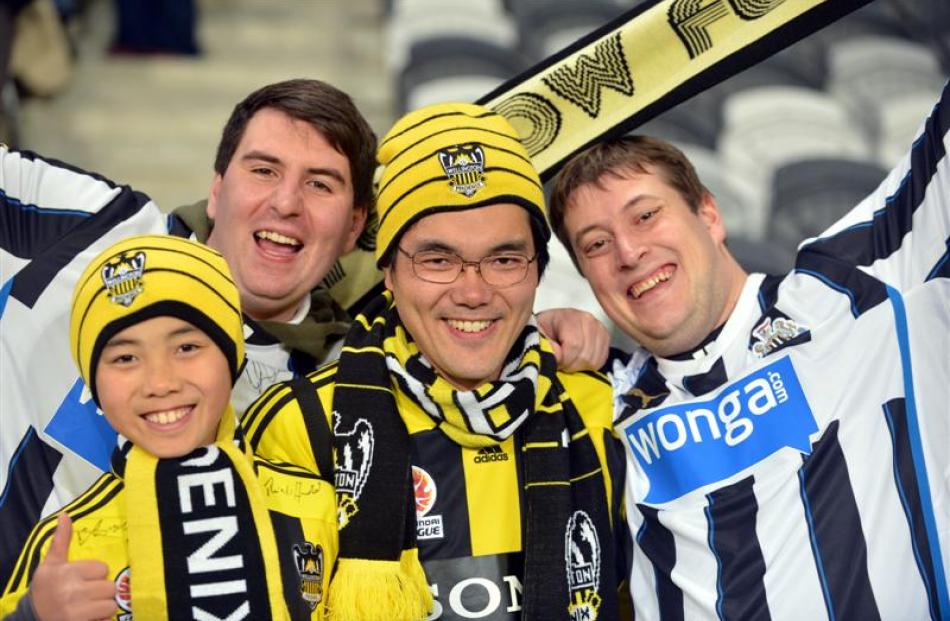 Enjoy the atmosphere are (from left) Ayoub Ahmad (11), of Dunedin, Sam Hickey, of Yorkshire,...