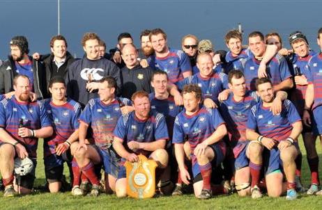 The West Taieri squad celebrates beating Eastern 28-13 to claim the senior grade title outright...