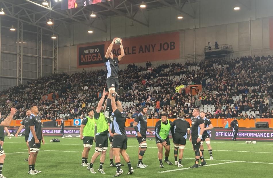 The All Blacks warm up in the moments before kickoff. PHOTO: STEPHEN JAQUIERY