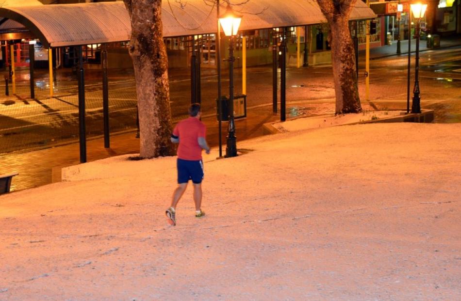 An early morning jogger runs through the Octagon.