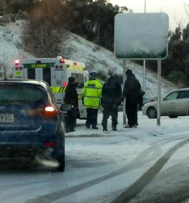 Emergency services at the scene of a crash on Saddle Hill. Photo supplied