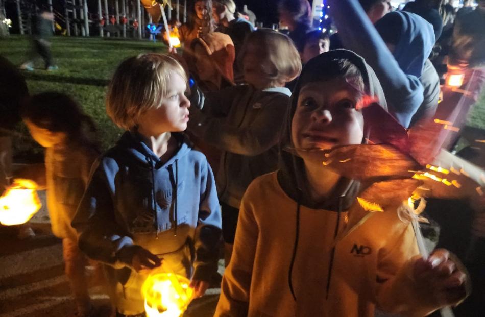 Gus Mills and Hayden Carpenter, take in what’s happening at the event and check out the night sky.