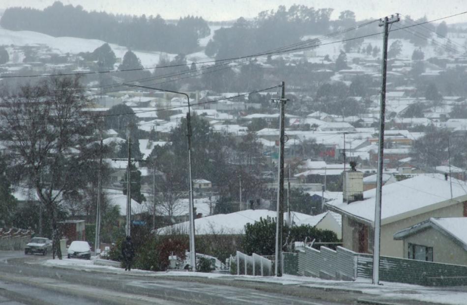 Grey . . . Sleet falls on Balclutha.