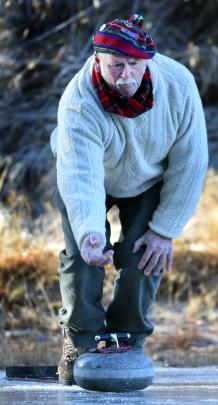 Darryn Wyber, of Naseby, casts his stone.