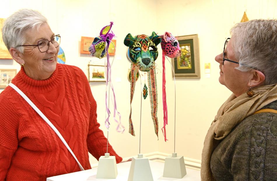 Rhonda Robertson (left), of Oamaru, and Kari Sheat, of Alexandra, admire 'Come into the Garden'...