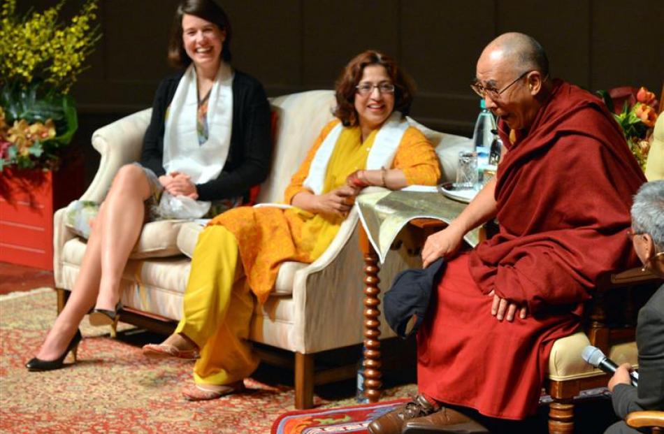 Dunedin city councillor Jinty MacTavish (left) and former mayor Sukhi Turner listen to the Dalai...