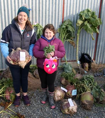 Kirsten McIntyre, Hannah Donovan, 8, and ‘‘Pinkie’’ among the whopper swede entries.