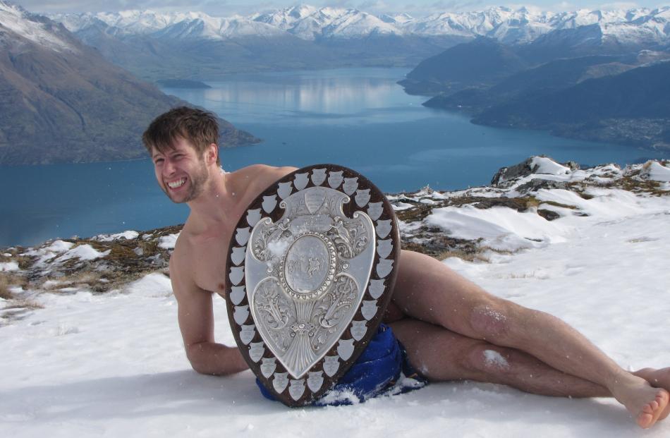 Otago winger Marshall Suckling takes the shield to the Remarkables mountain range. Photo by...