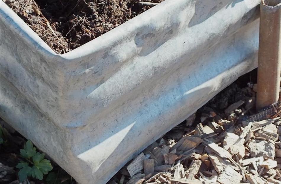 Corrugated iron is an edging option.