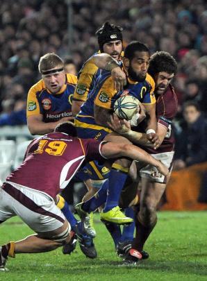 2010 - Otago players from left - Blair Toung, Hoani matenga, Fetu'u Vainikolo[with ball] and...