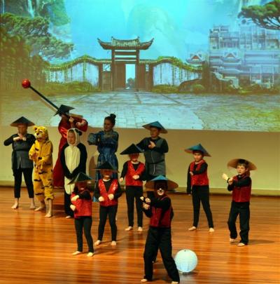 Kung Fu Fighting (below) during the Abbotsford School Musical at Otago Boys' High School on...