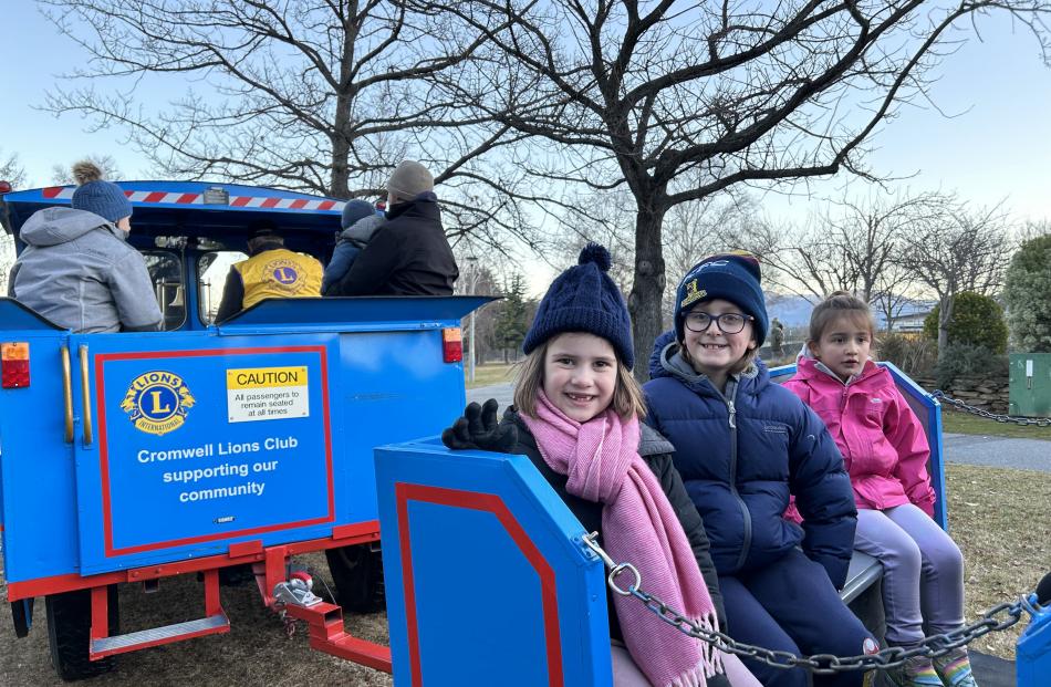 Enjoying a trip on Thomas the Tank engine, courtesy of the Cromwell Lions, at Light Up Winter are...