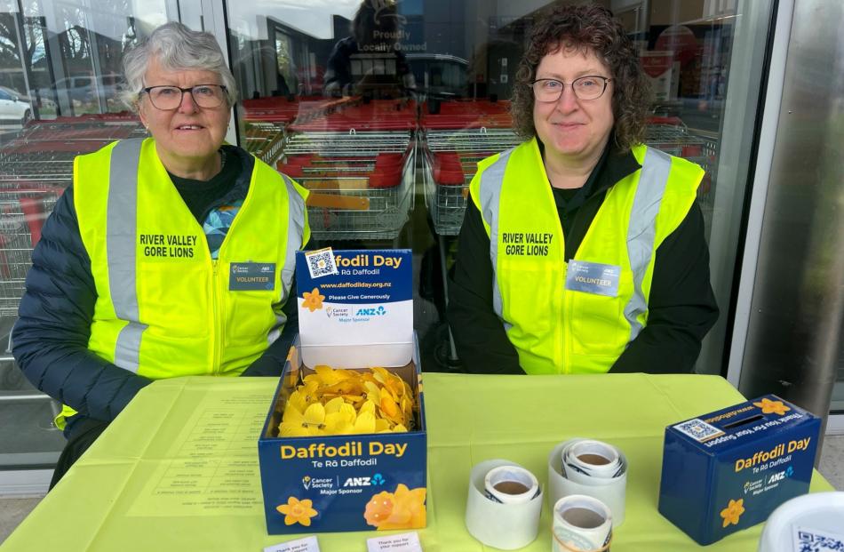 Gore River Valley Lions Club members Janet Humphries (left) and Nicola Crosbie collect donations....