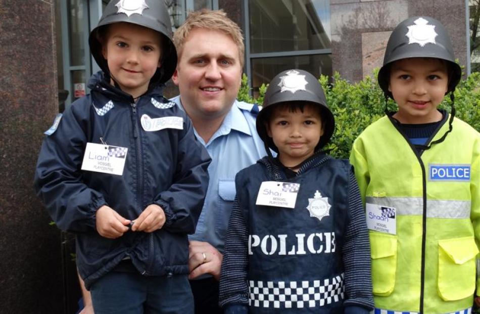 Getting a photo taken with Sergeant Reece Munro was a highlight for Liam Lord (4, left), Shai Lal...