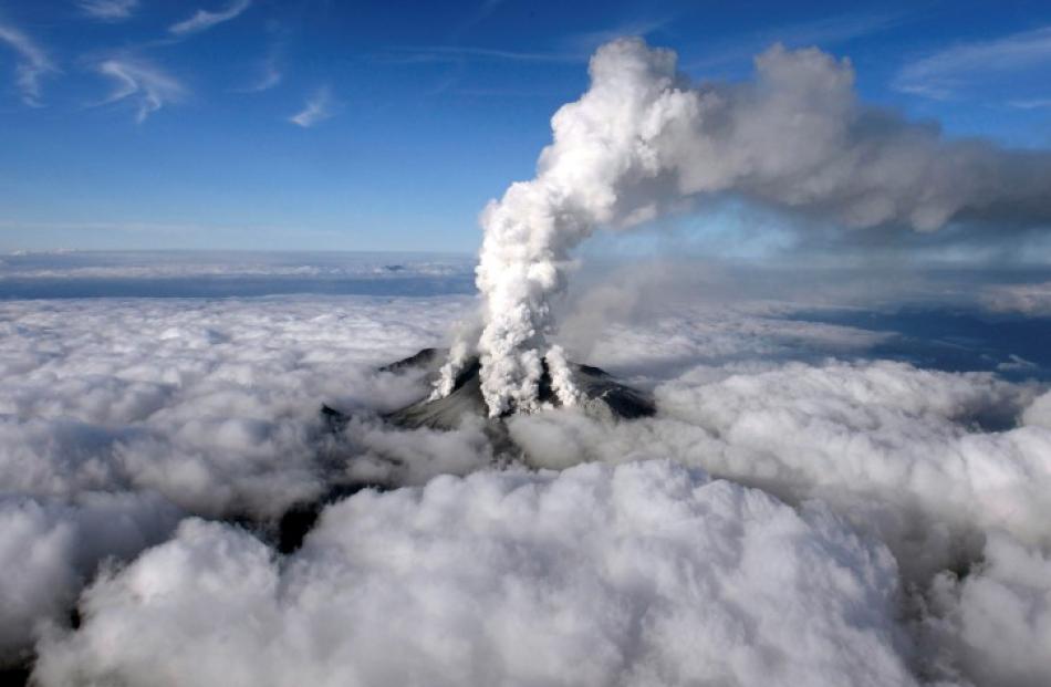 Smoke rises from the volcano. REUTERS/Kyodo