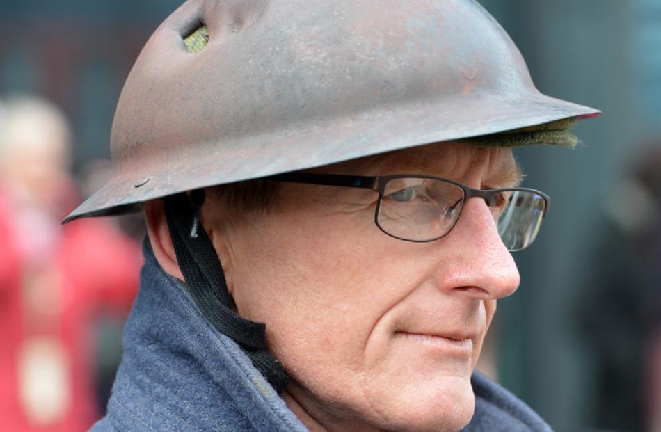 Colin Bishop, from Invercargill, wears a British WW1 helmet.