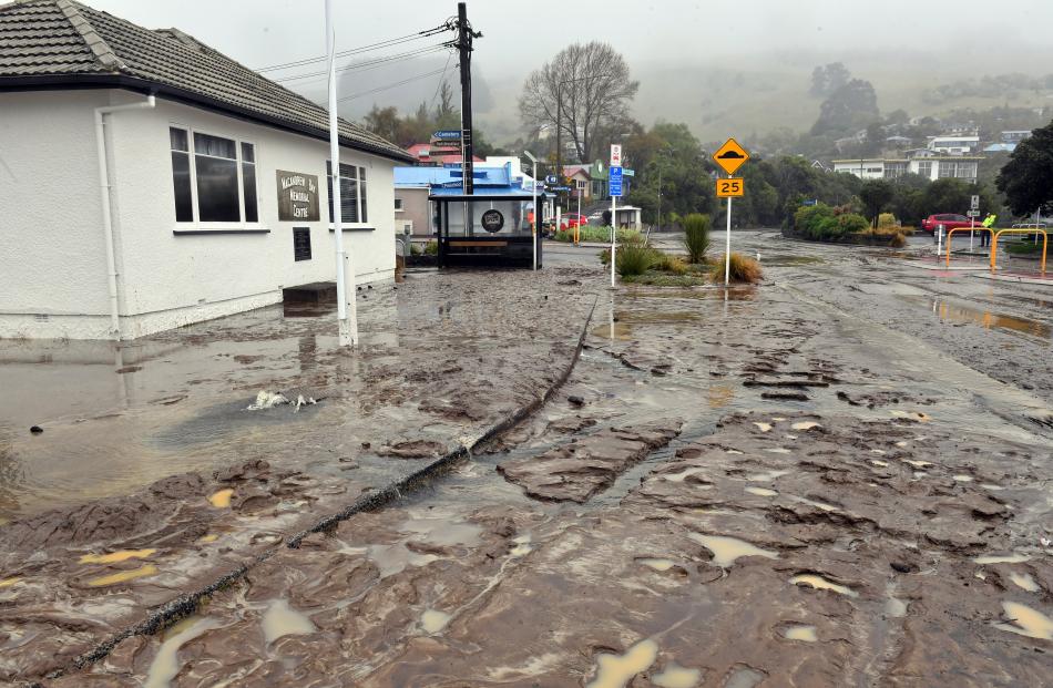 The Macandrew Bay shopping centre awash with mud. PHOTO: STEPHEN JAQUIERY