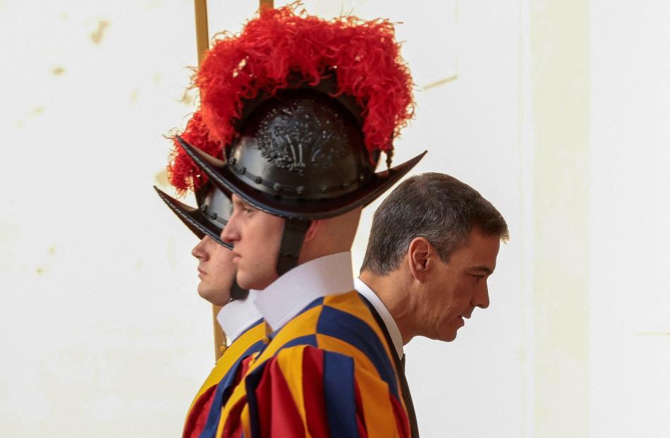 Spanish Prime Minister Pedro Sanchez arrives at the San Damaso courtyard ahead of a meeting with...